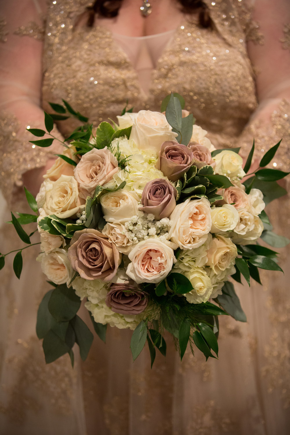 Colleen used a piece of lace from her mother's wedding dress to wrap her bouquet. - 